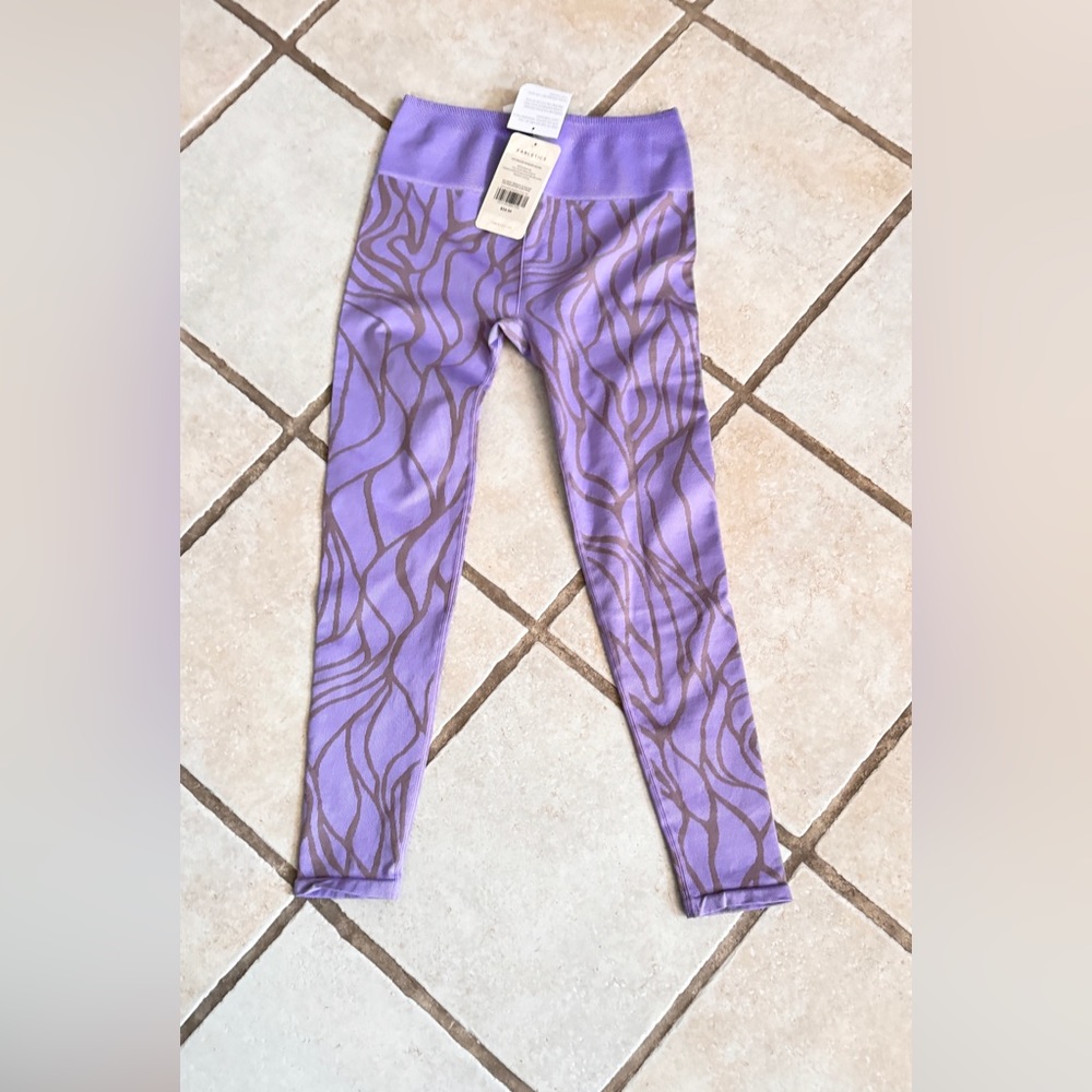 Leggings, never worn , marked size M , but run smaller like size S